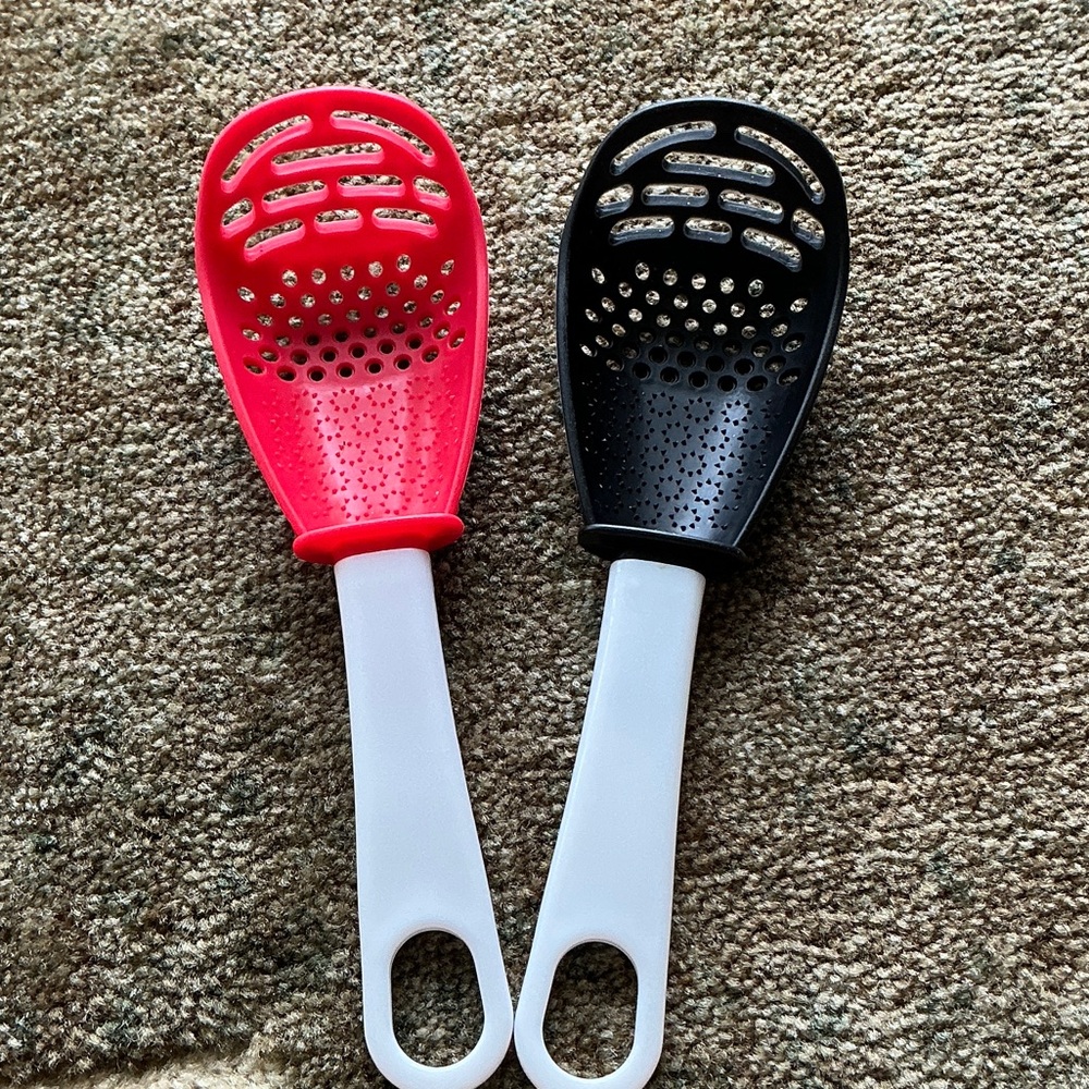 Red and Black Slotted Kitchen Spoons